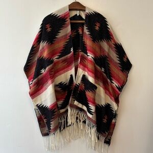 Acrylic Aztec Southwestern pattern poncho with pockets and fringe cape shawl